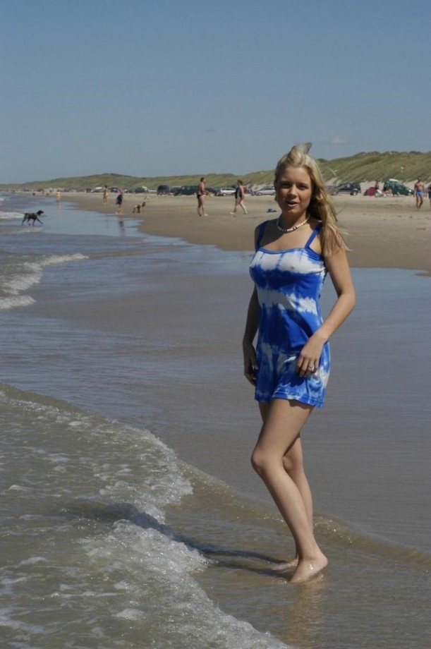 Swedish blond teen having fun on the beach