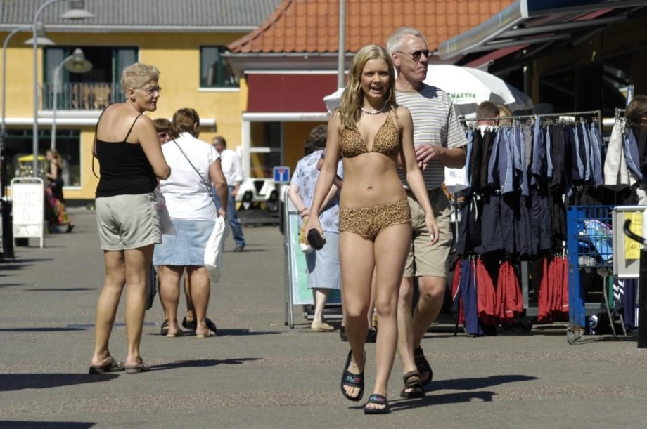 Swedish blond teen having fun on the beach