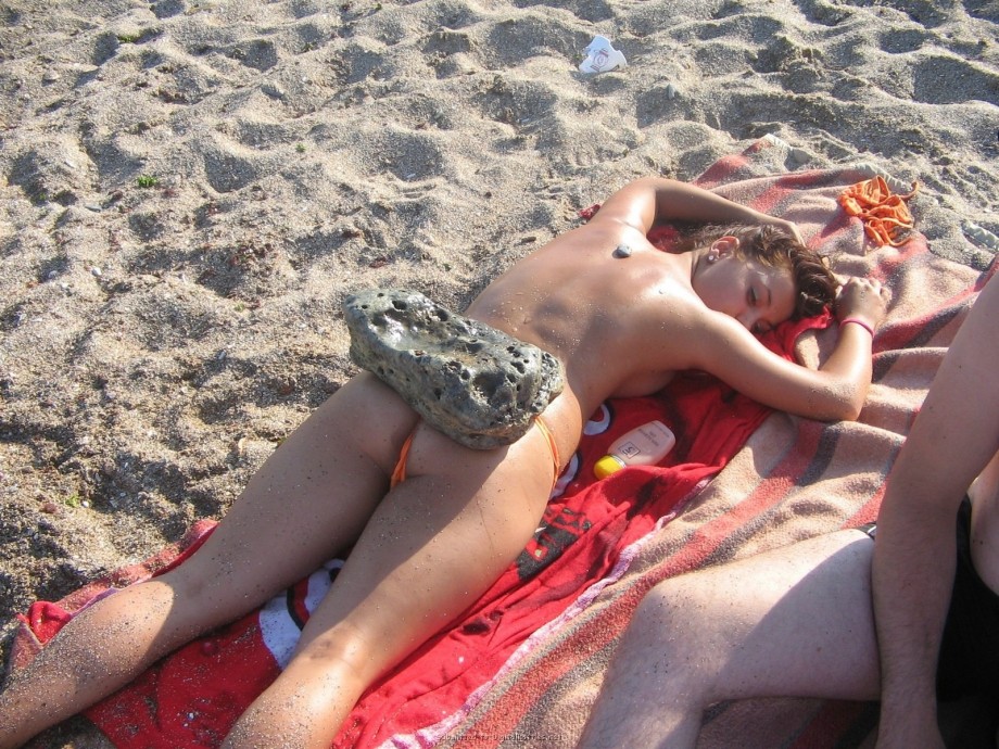 Young teen couple on the beach 