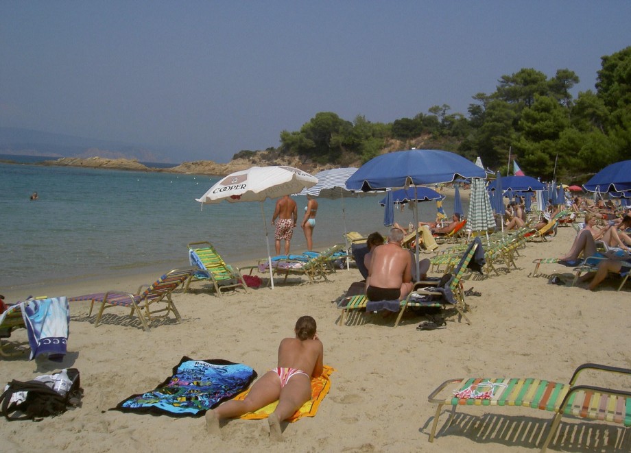 Teen blond girl on holiday  at the beach