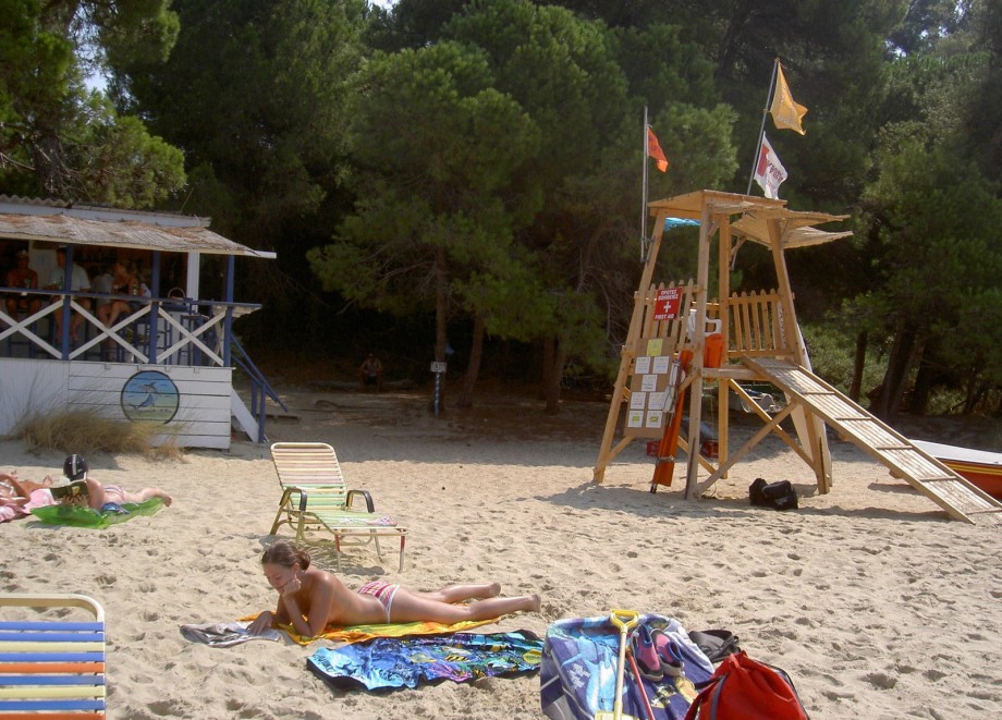 Teen blond girl on holiday  at the beach