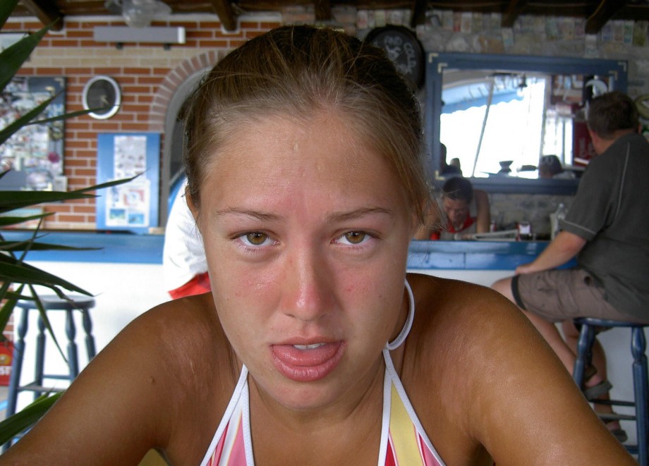 Teen blond girl on holiday  at the beach