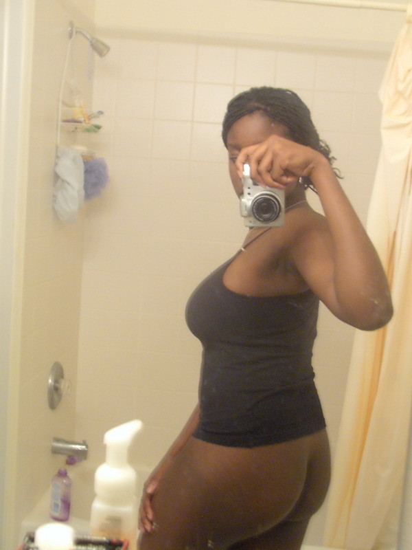 Black amateur girl and her big  tits on selfpics