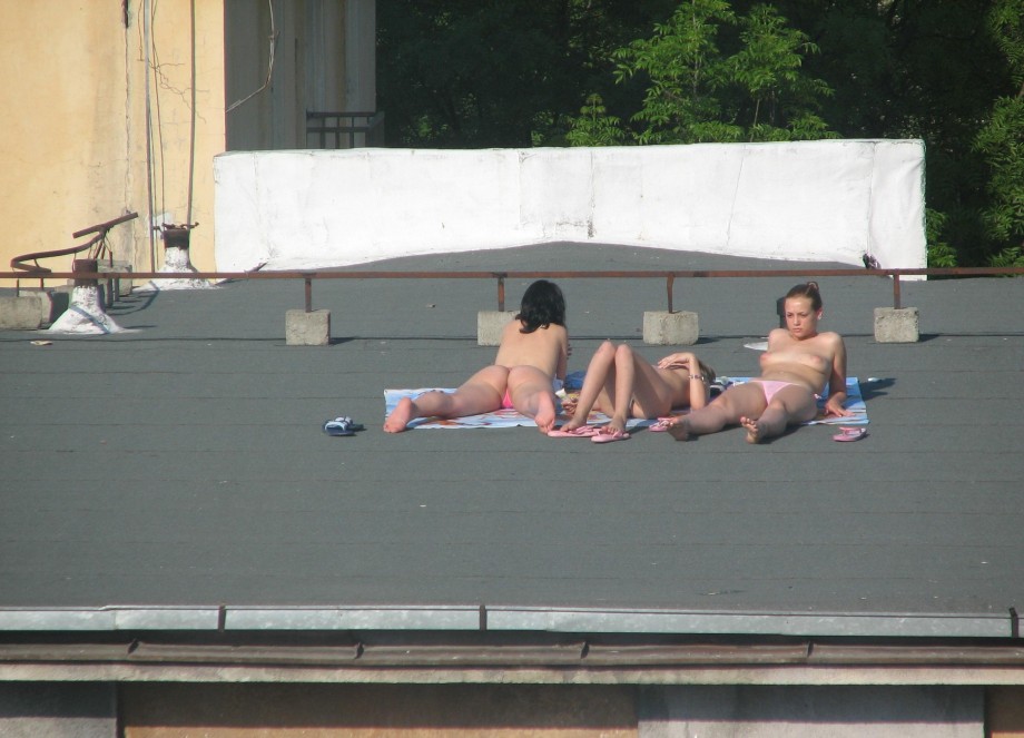 Teens sunbathing in the roof ( voyeur )