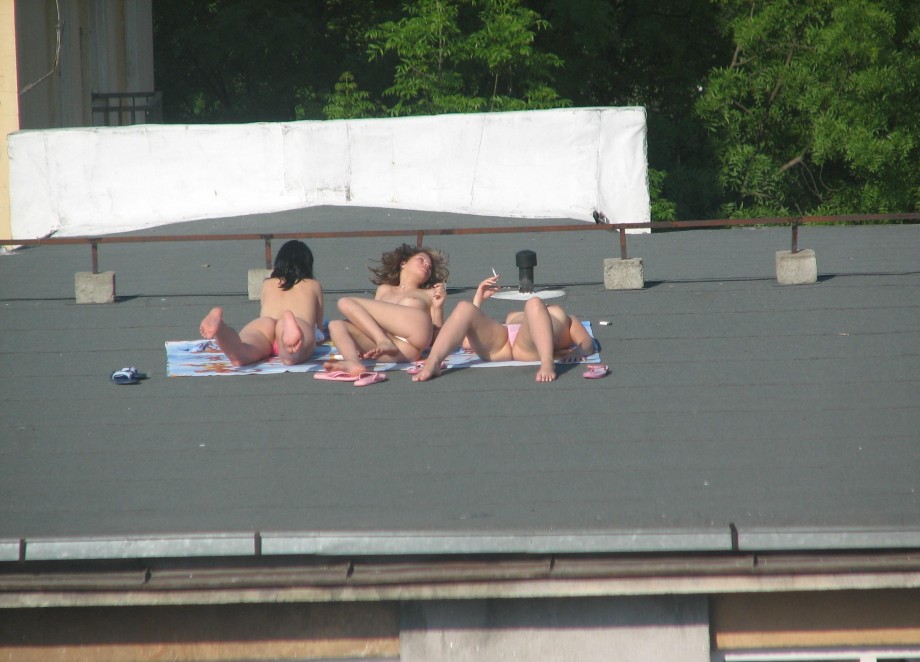 Teens sunbathing in the roof ( voyeur )