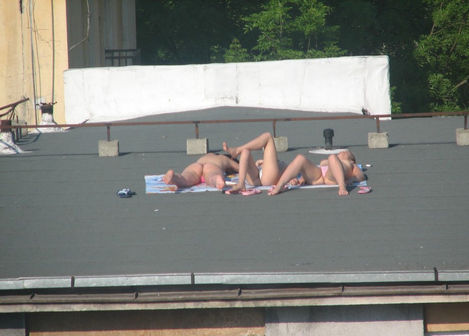 Teens sunbathing in the roof ( voyeur )