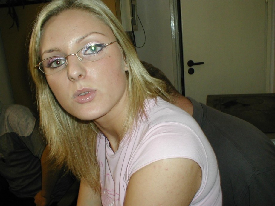 Blonde girl with glasses on a party 