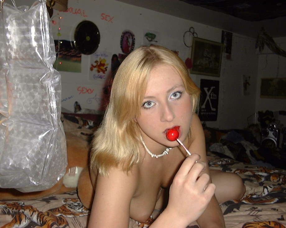 Fantastic young blonde poses and licks on her loll