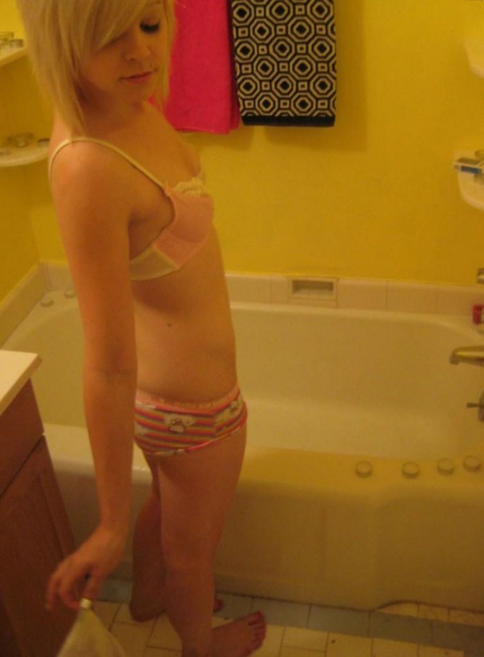 Cute blonde in bathtub 