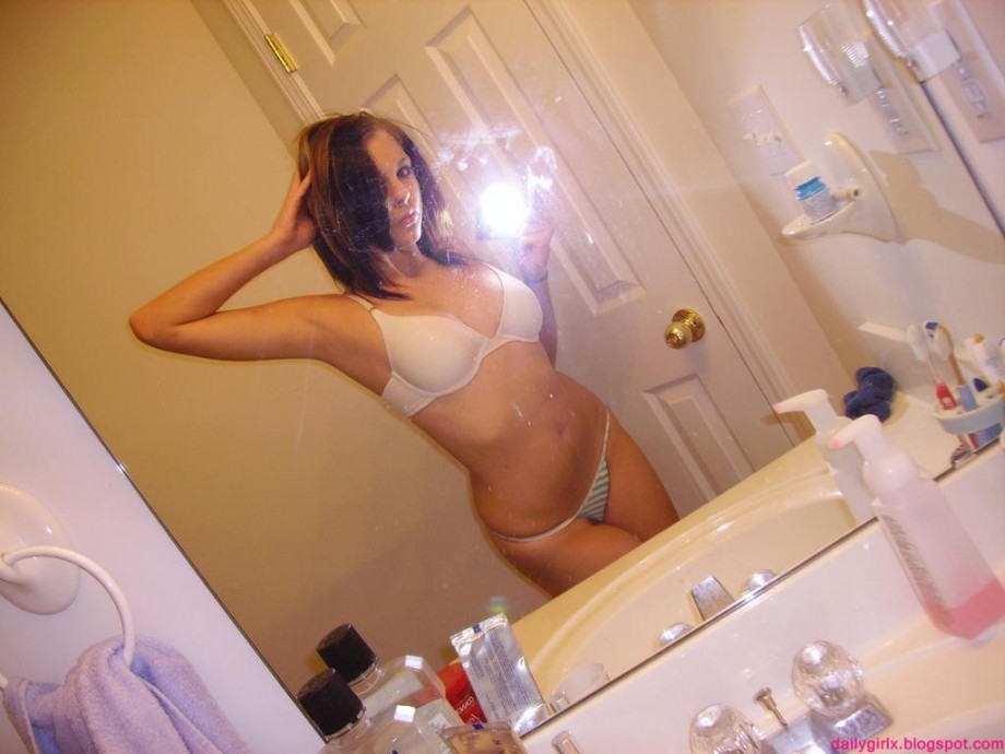 Selfshot pics - cute teen showing tits in bathroom