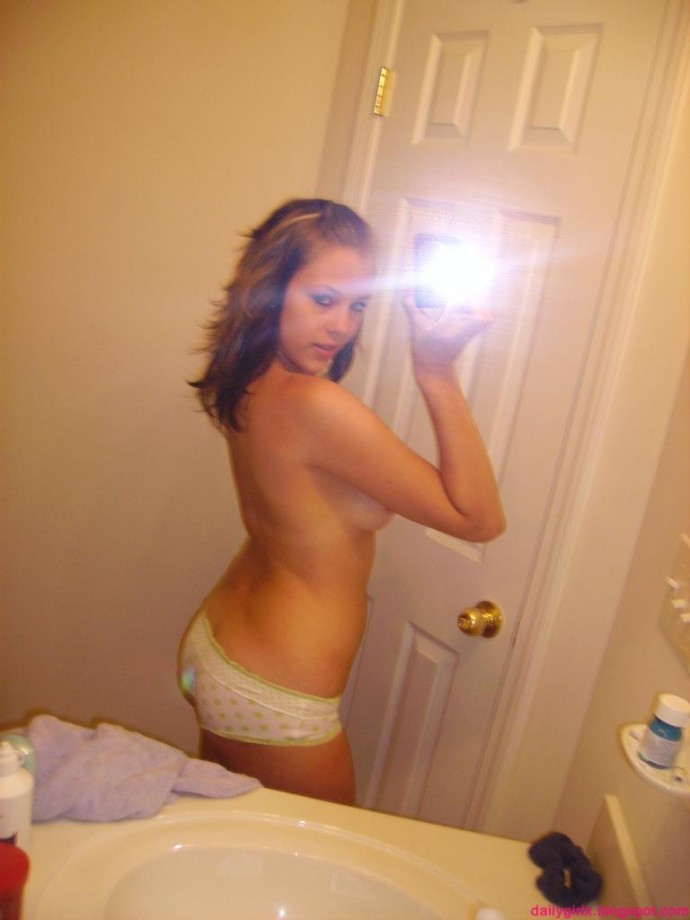 Selfshot pics - cute teen showing tits in bathroom