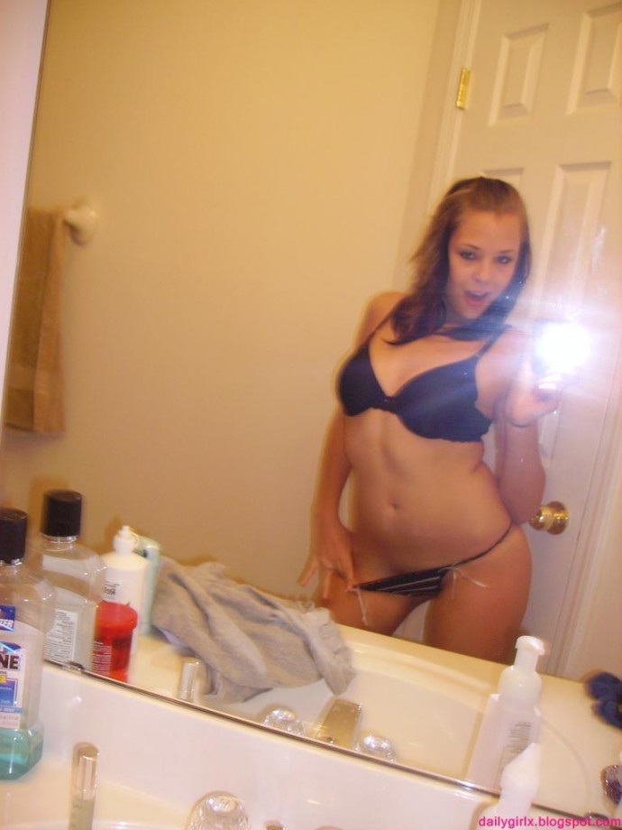 Selfshot pics - cute teen showing tits in bathroom