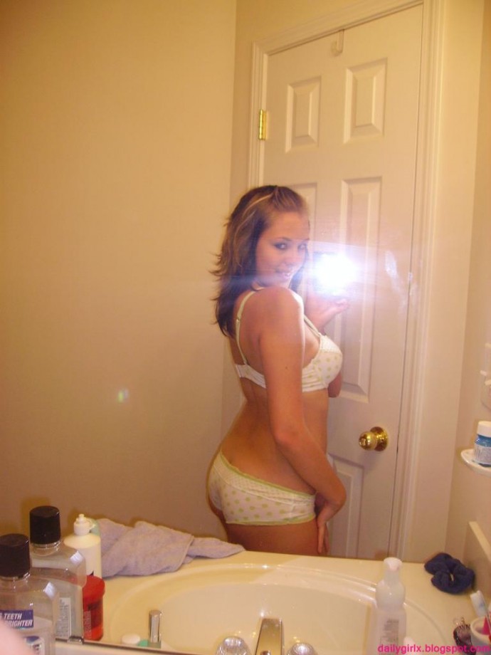 Selfshot pics - cute teen showing tits in bathroom