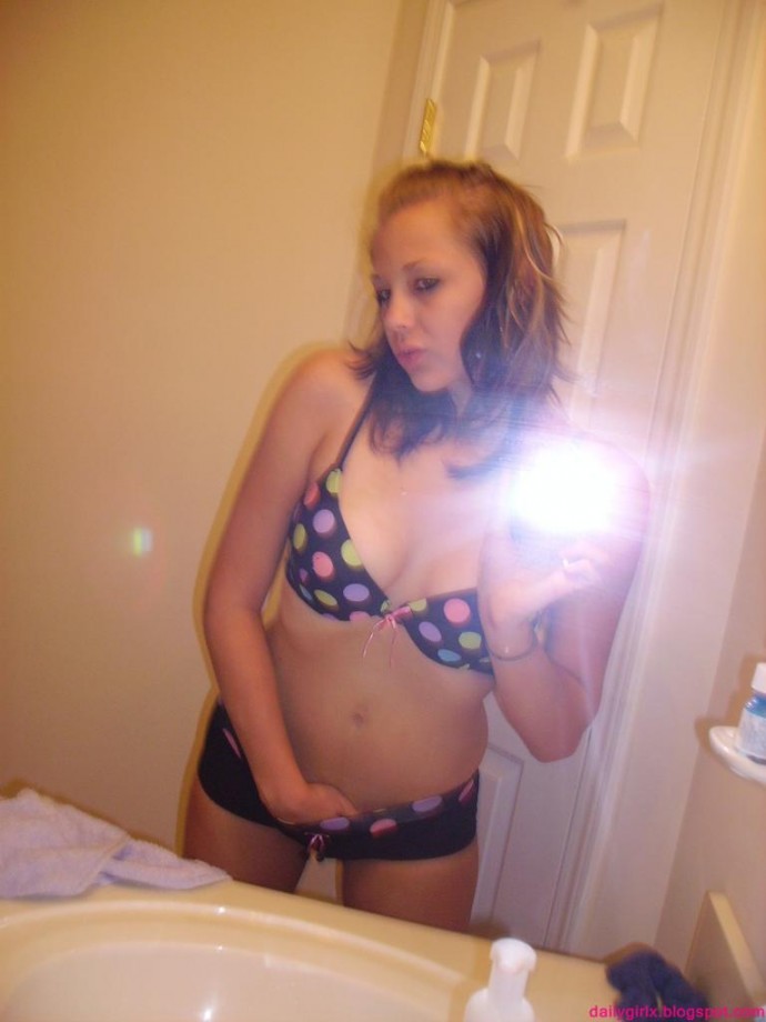 Selfshot pics - cute teen showing tits in bathroom