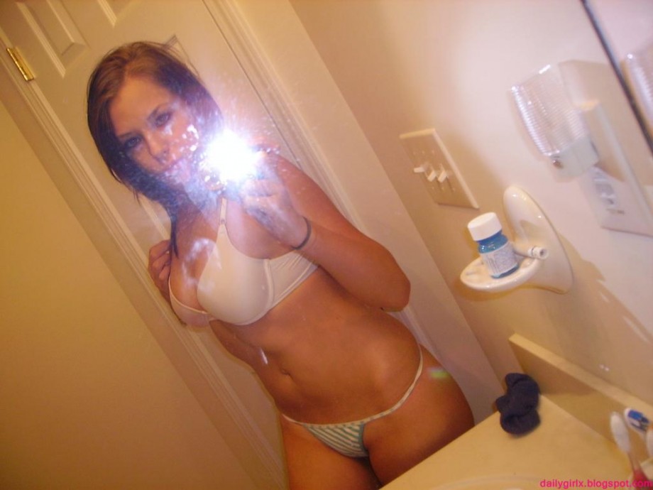 Selfshot pics - cute teen showing tits in bathroom