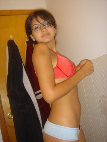 Latina teen girl in bathroom