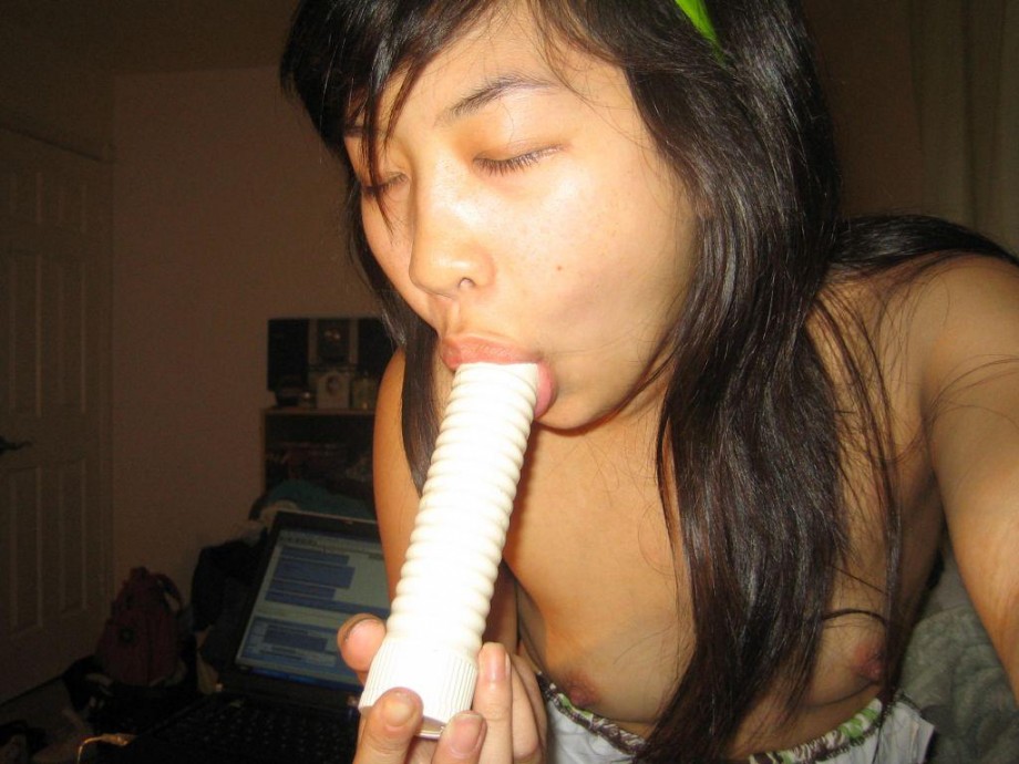 Asian teen plays with pussy and asshole 