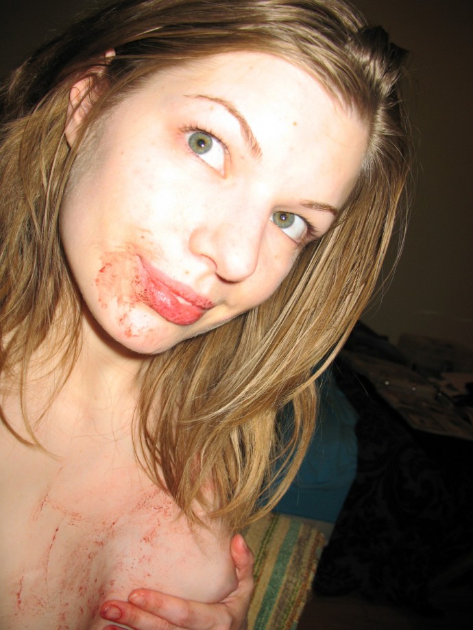 Amateur teen fingering her bloody pussy