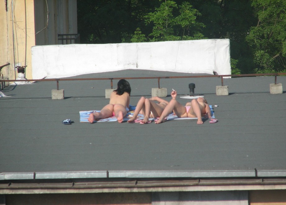 Spycam - nude girls on the roof