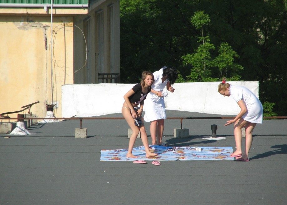 Spycam - nude girls on the roof