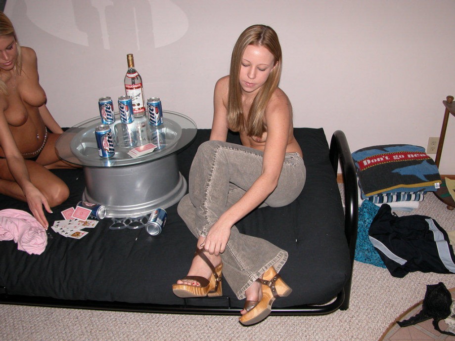 Two girls playing strip poker 