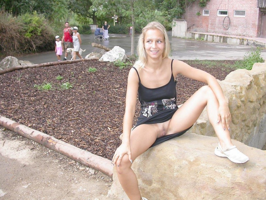 Young blonde girl and her exhibition  from the zoo