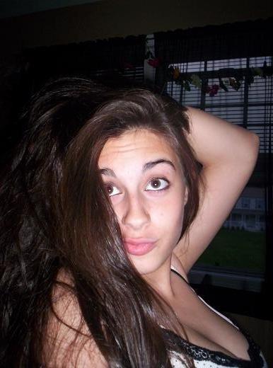 Sexy brunette with big boobs take selfshots