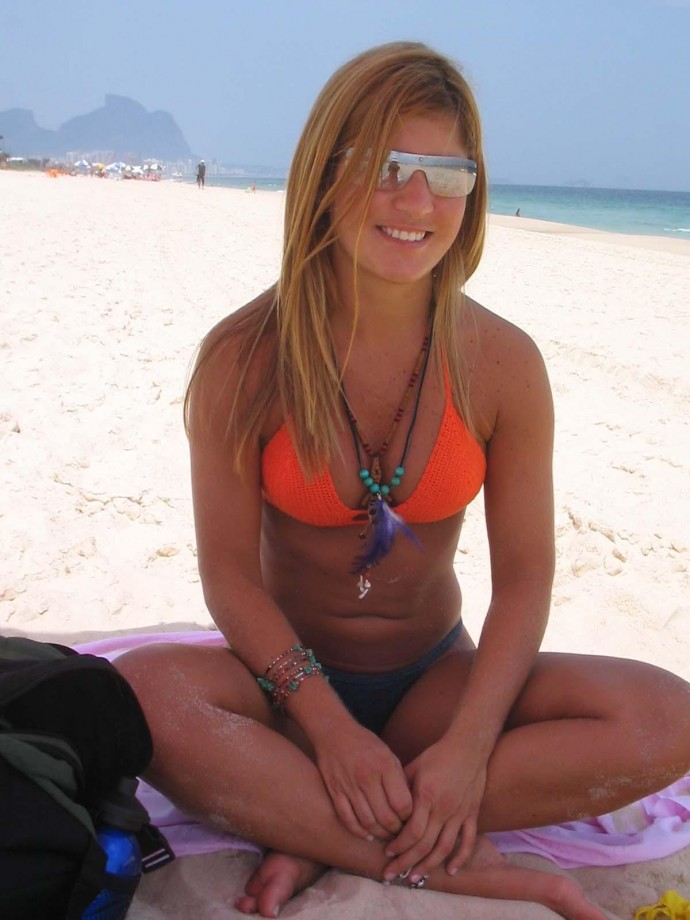 Blonde cutie with hot tanlines at beach