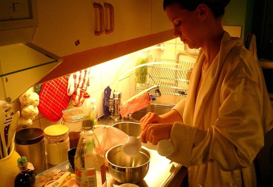 Young wife doing housework 