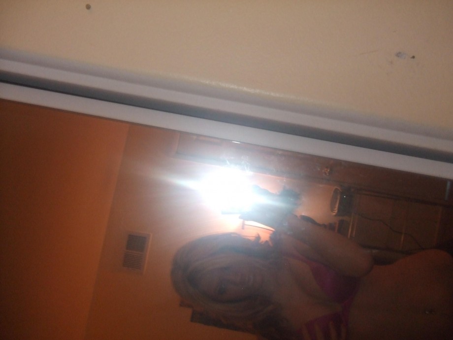 Blonde takes pics of herself 