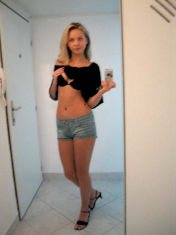 Blonde beauty strip selfshot