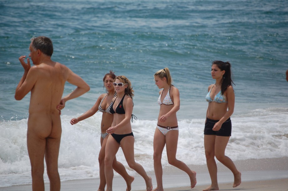 Three teen girls blend in on a nudist beach