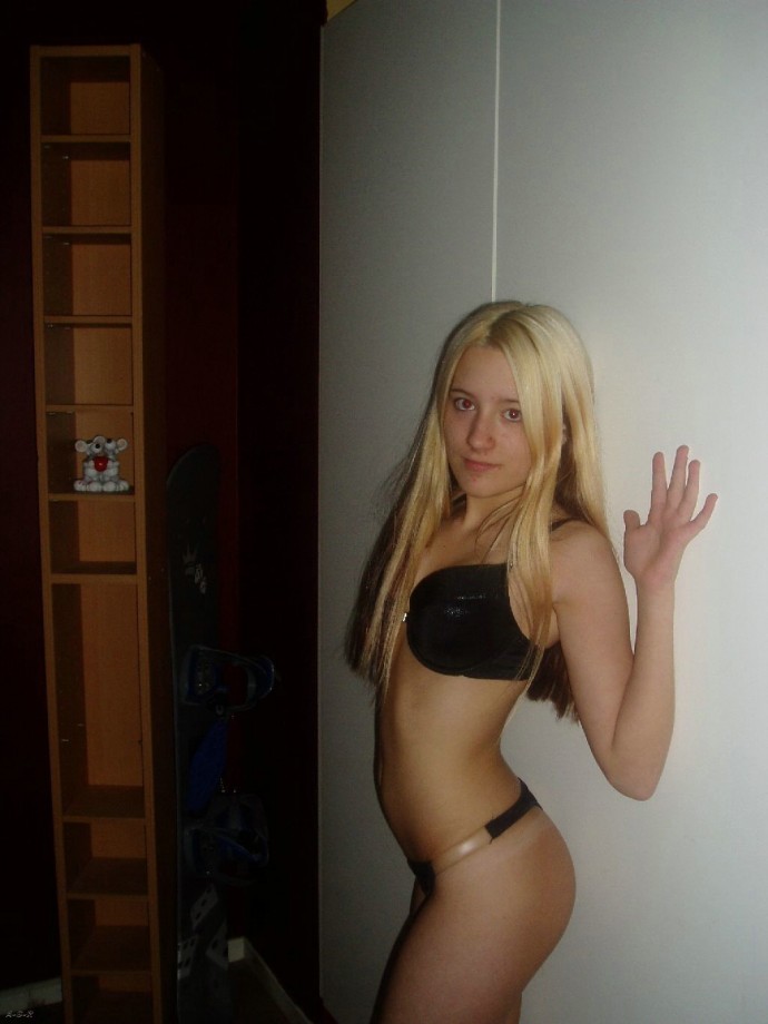 Blonde girl pose at home