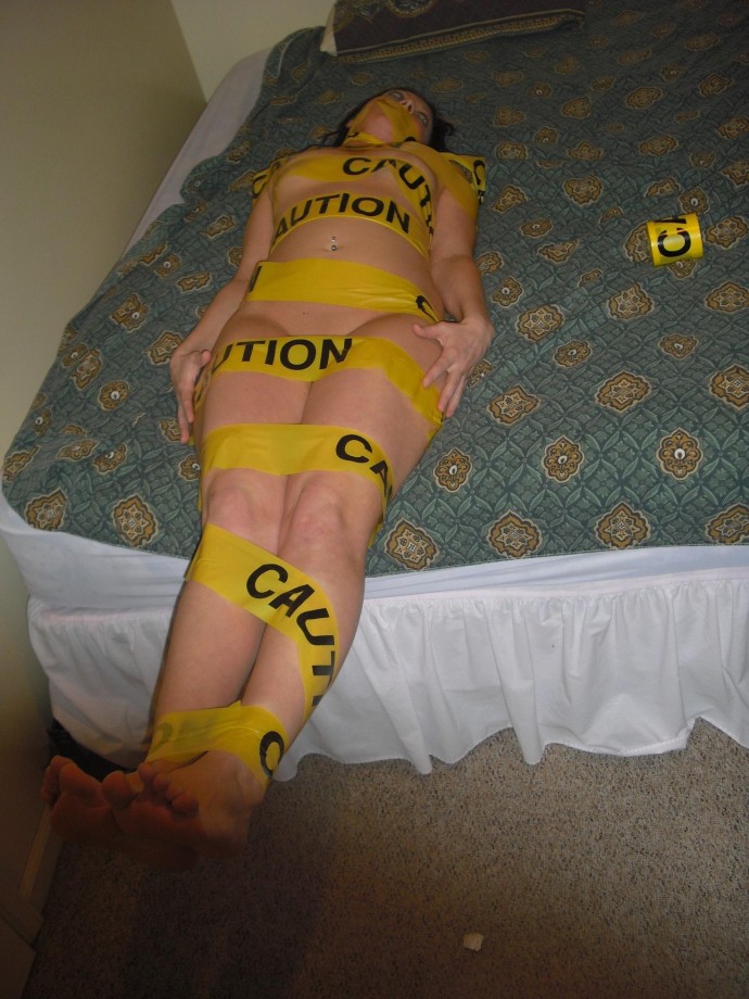 Tight blonde with caution tape