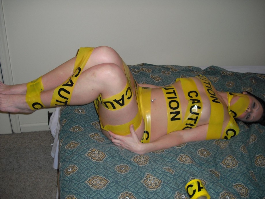 Tight blonde with caution tape