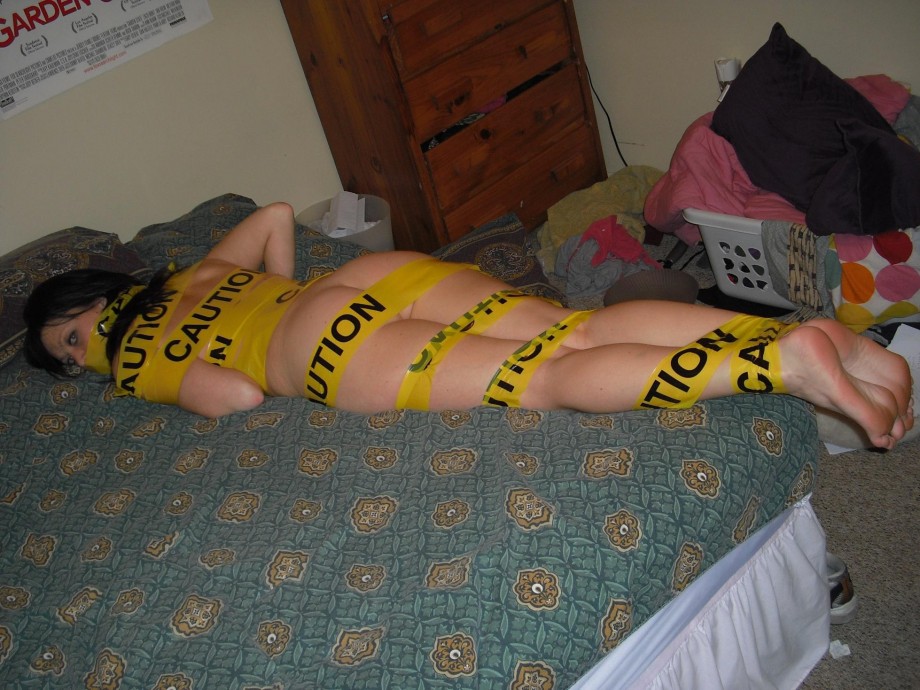 Tight blonde with caution tape