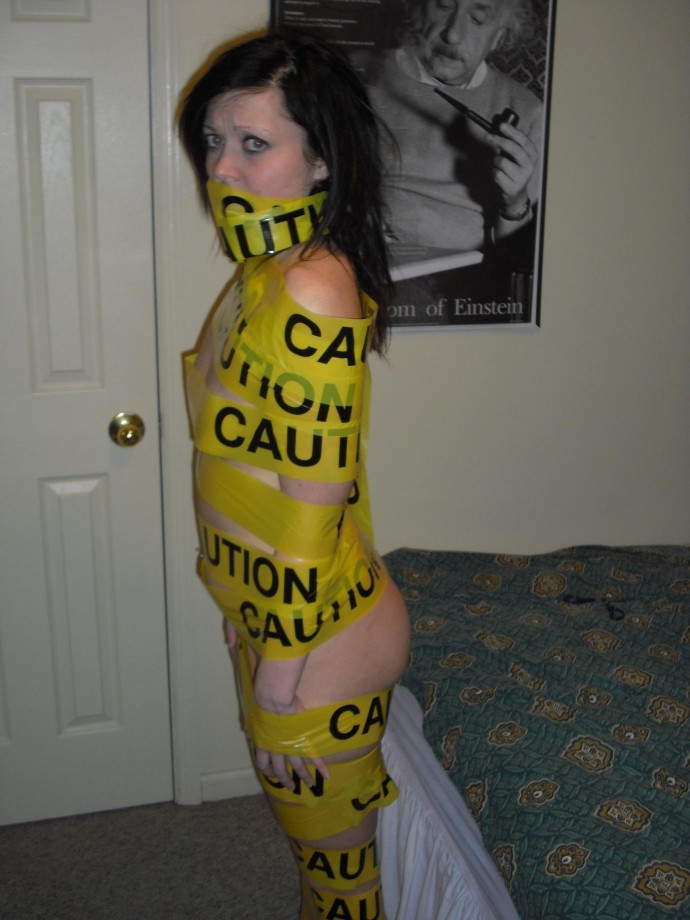 Tight blonde with caution tape