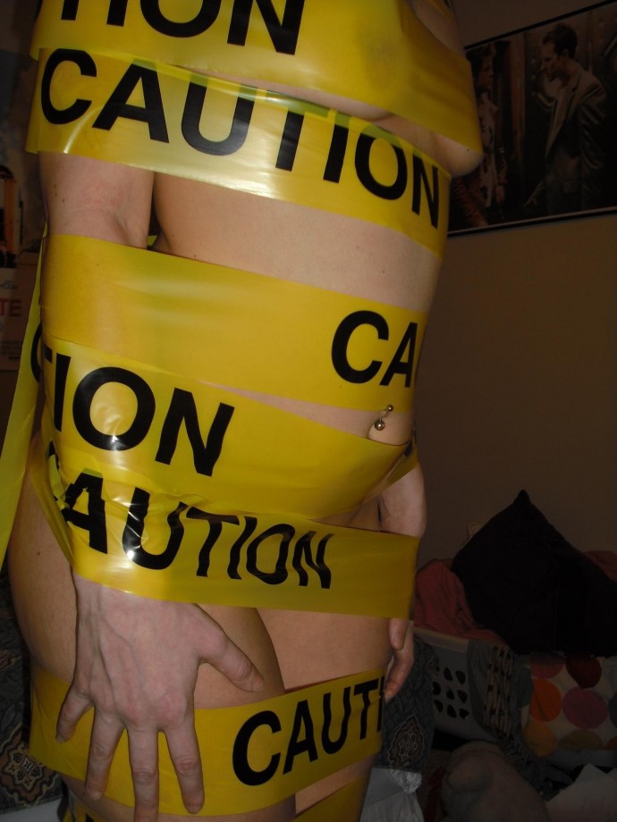 Tight blonde with caution tape