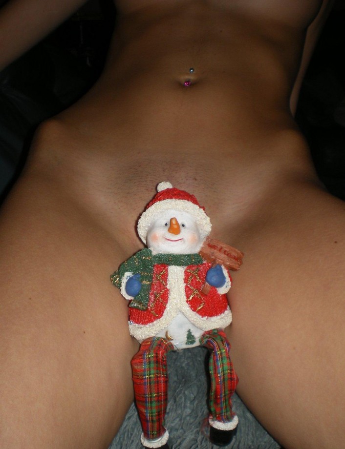 Girl poses naked on christmas