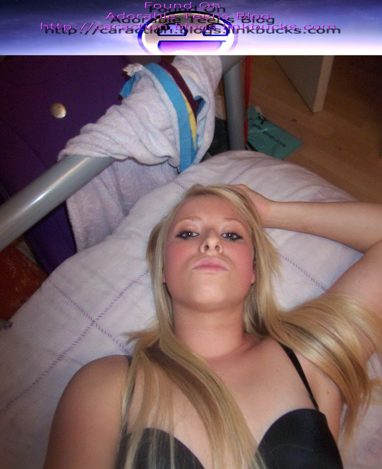 Selfshot blond in purple room