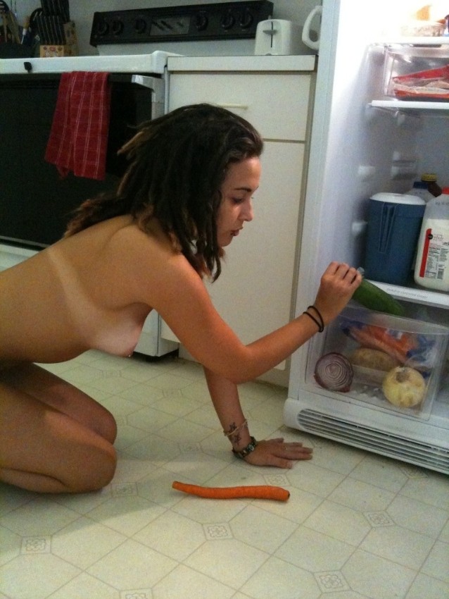 Tattooed brunette loves vegetables