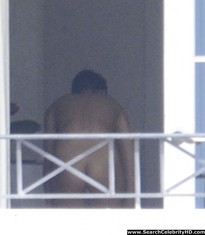 Rihanna naked ass and topless boobs candids through her balcony window - celebrity