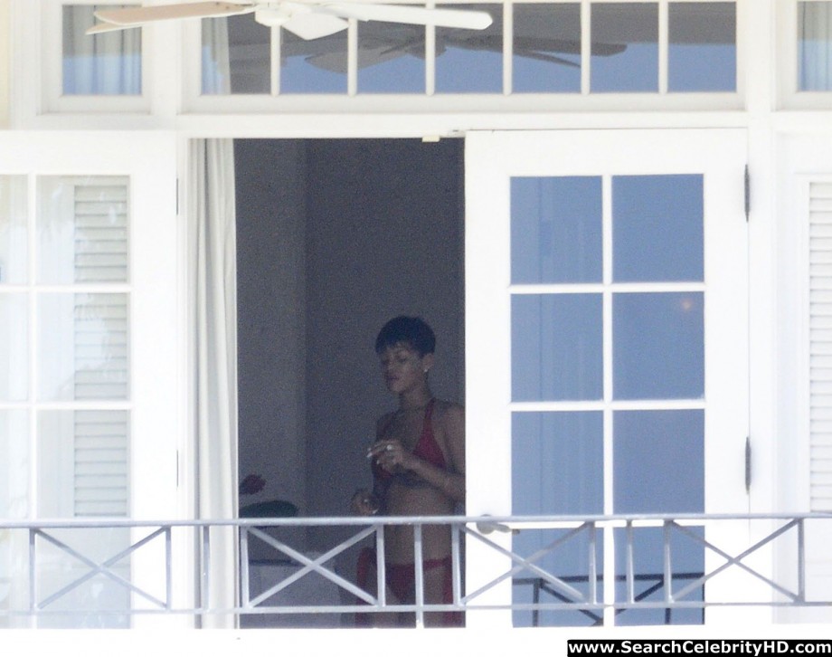 Rihanna naked ass and topless boobs candids through her balcony window - celebrity