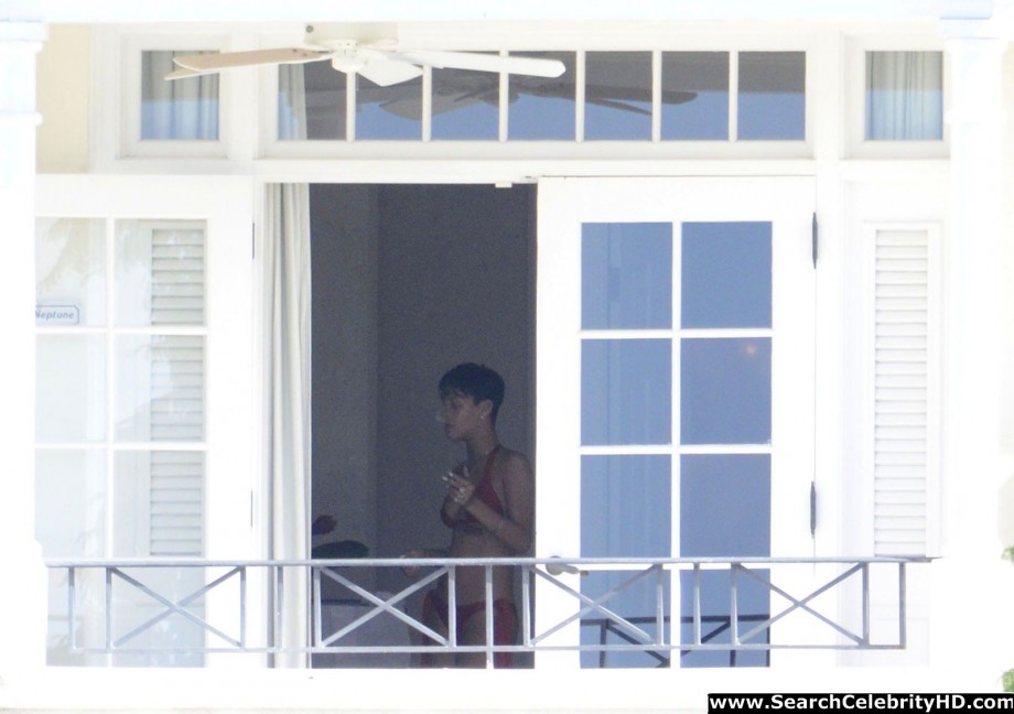 Rihanna naked ass and topless boobs candids through her balcony window - celebrity