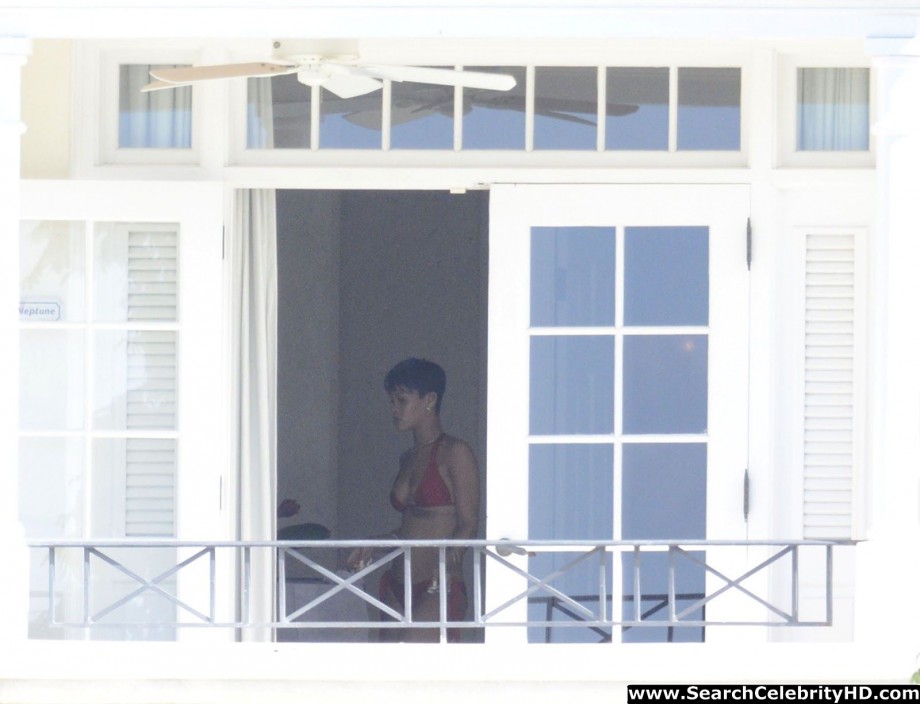 Rihanna naked ass and topless boobs candids through her balcony window - celebrity