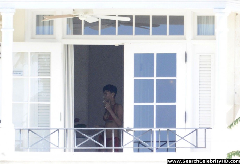 Rihanna naked ass and topless boobs candids through her balcony window - celebrity