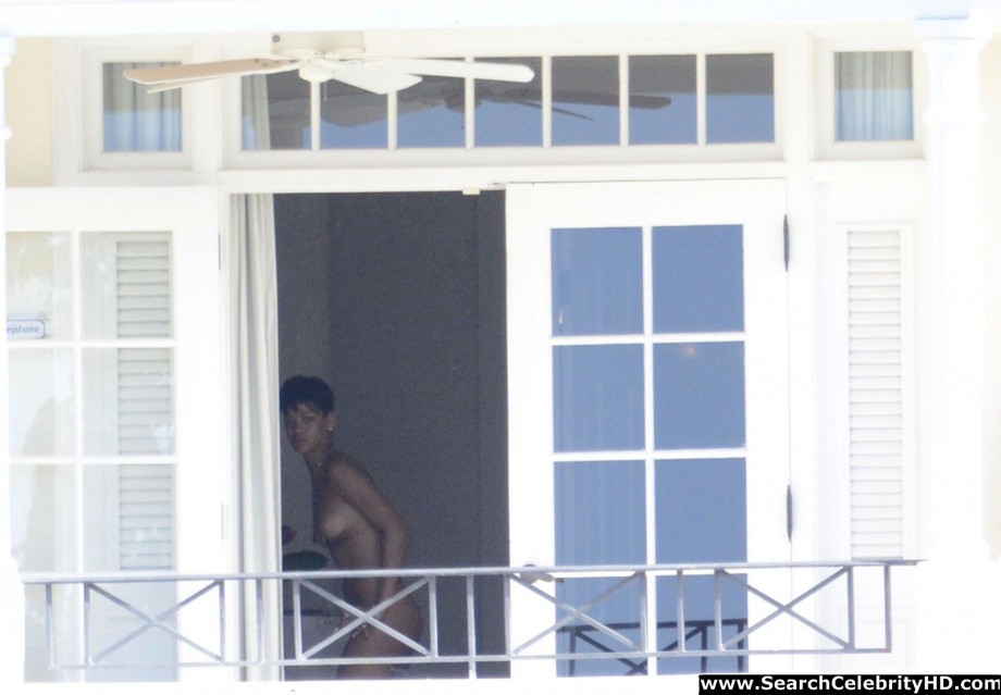 Rihanna naked ass and topless boobs candids through her balcony window - celebrity