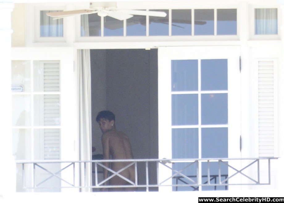 Rihanna naked ass and topless boobs candids through her balcony window - celebrity