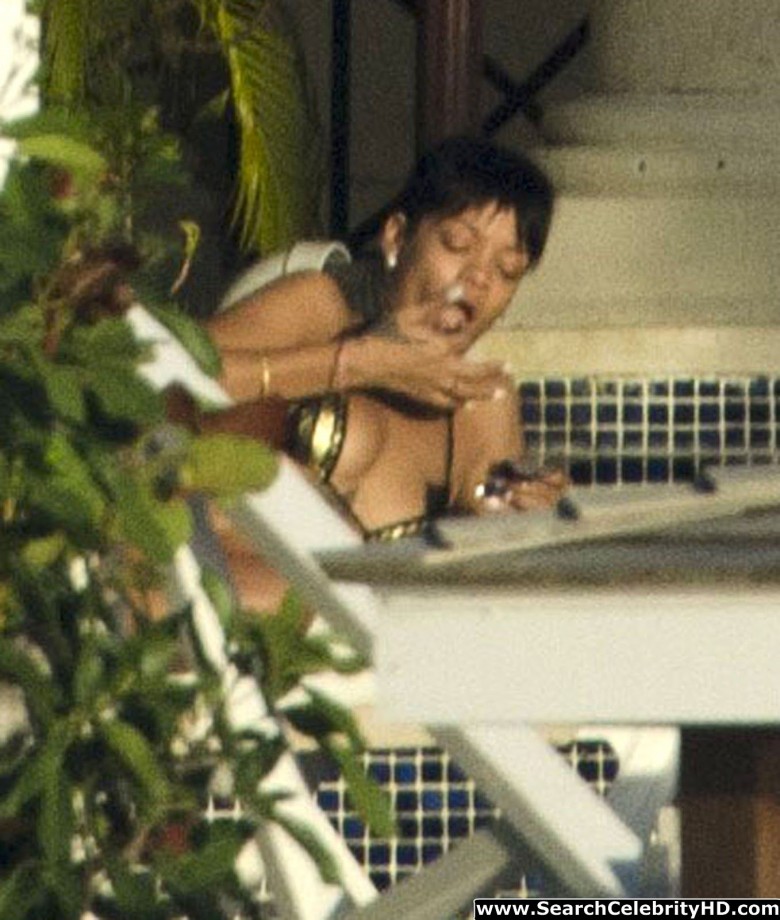 Rihanna naked ass and topless boobs candids through her balcony window - celebrity