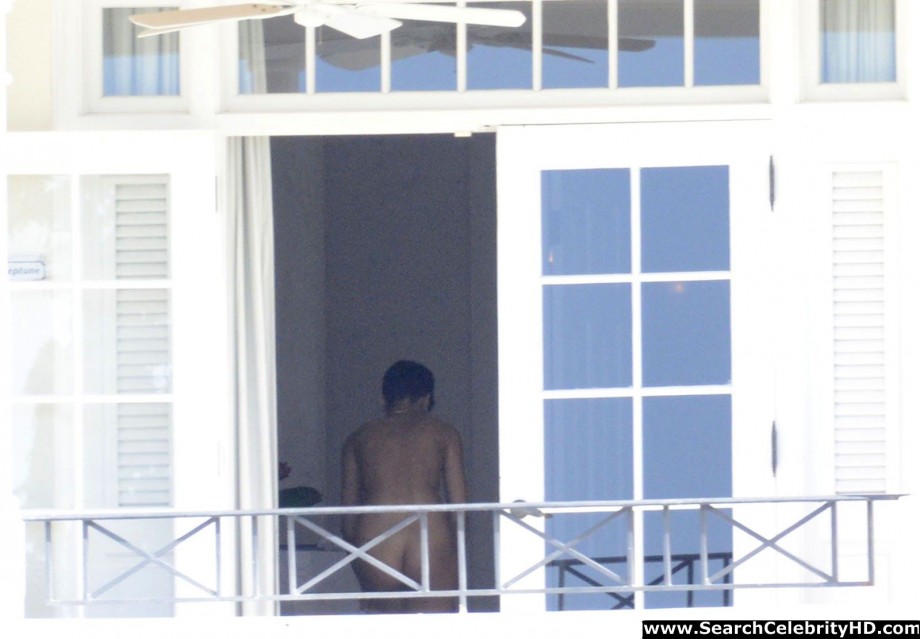 Rihanna naked ass and topless boobs candids through her balcony window - celebrity